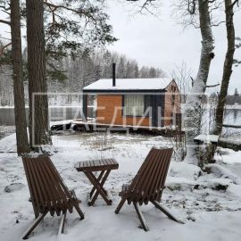 Просторная терраса хаусбота «Сила Вуоксы» для отдыха на воде | Наедине - дома на воде